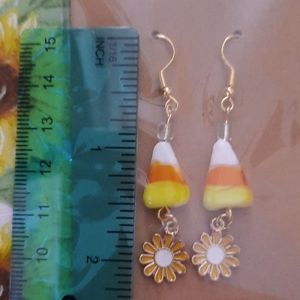 Earrings. Candy corn and Yellow Daisey Dangles approx. 2 1/4"
